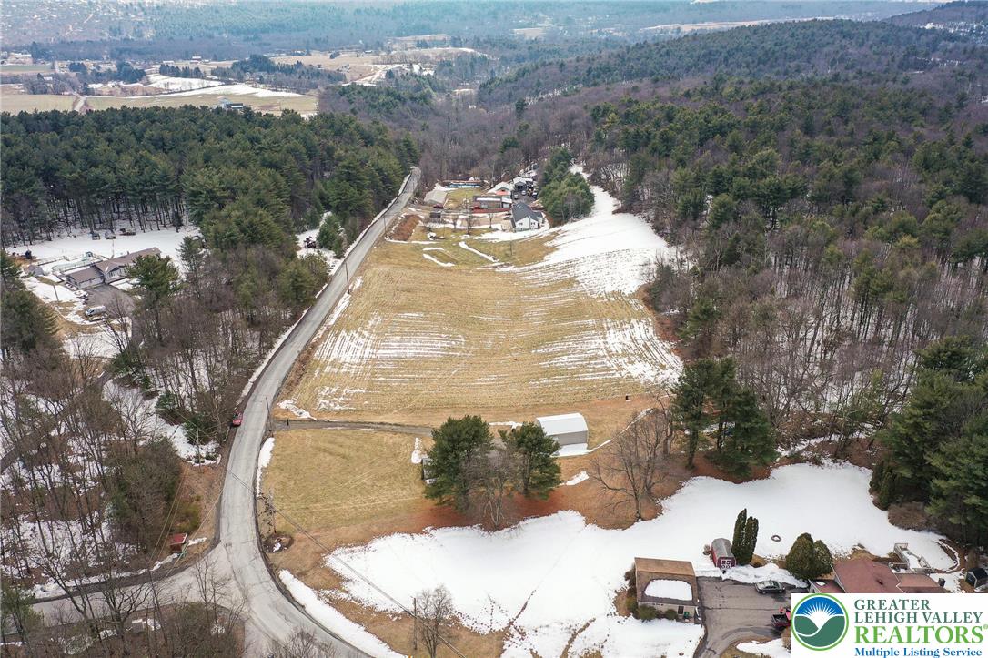 1115 Smithlane Road Lehighton, PA 18235 - Photo 5 of 24 a view of a wooden floor with a water view