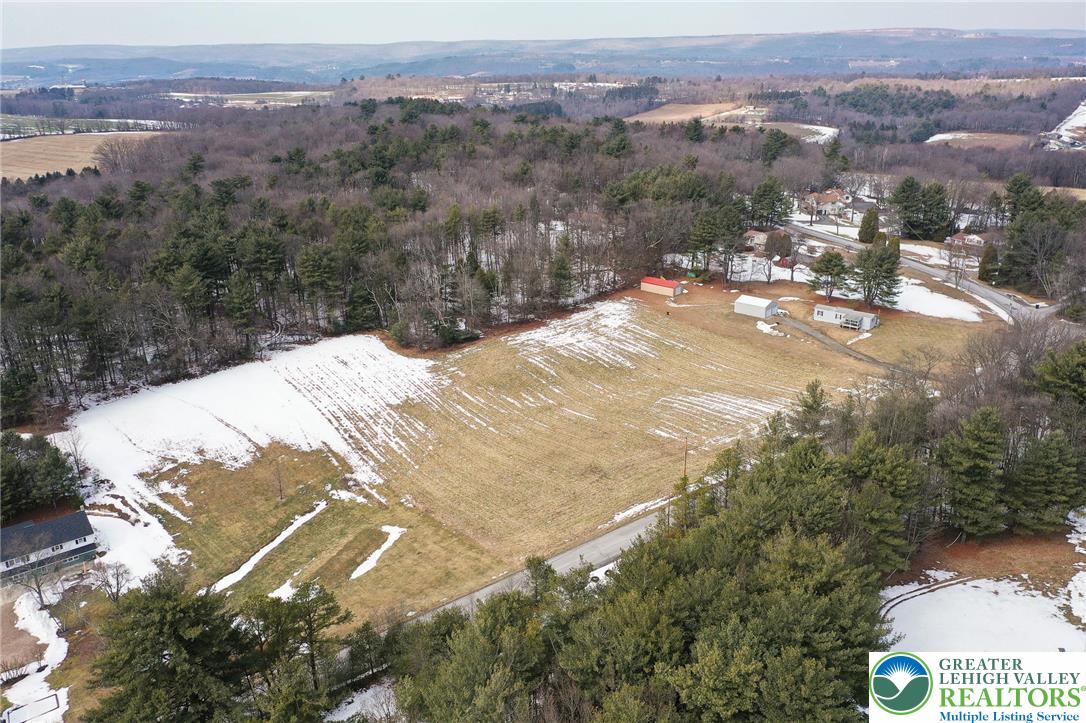 1115 Smithlane Road Lehighton, PA 18235 - Photo 7 of 24 a view of a backyard of a house