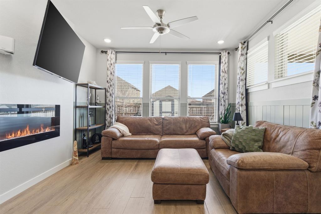 5613 Smt Crk Road Fort Worth, TX 76126 - Photo 13 of 40 a living room with furniture and a flat screen tv