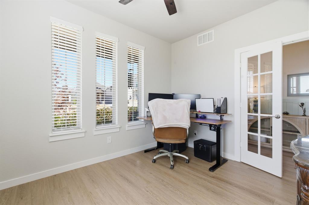 5613 Smt Crk Road Fort Worth, TX 76126 - Photo 14 of 40 a view of a workspace with furniture and a window