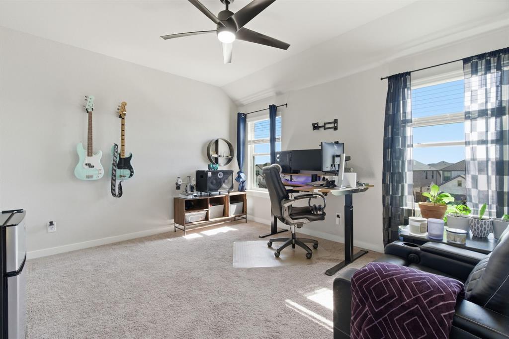 5613 Smt Crk Road Fort Worth, TX 76126 - Photo 22 of 40 a view of a livingroom with workspace and a couch