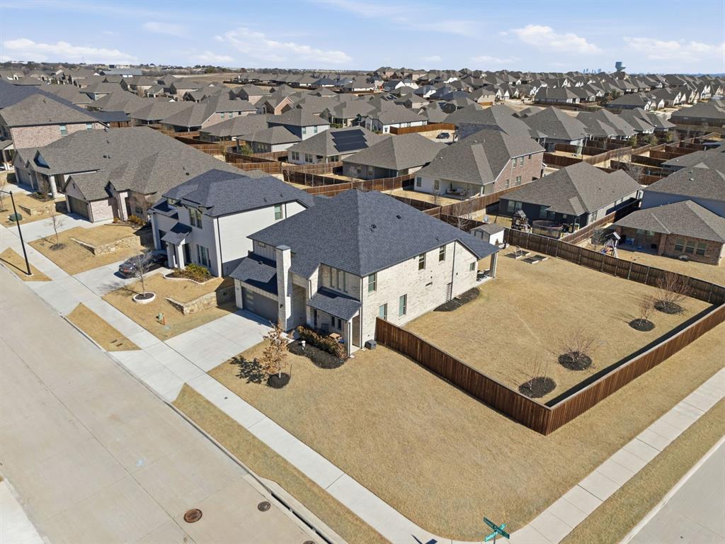 5613 Smt Crk Road Fort Worth, TX 76126 - Photo 3 of 40 an aerial view of a residential apartment building with a mountain view