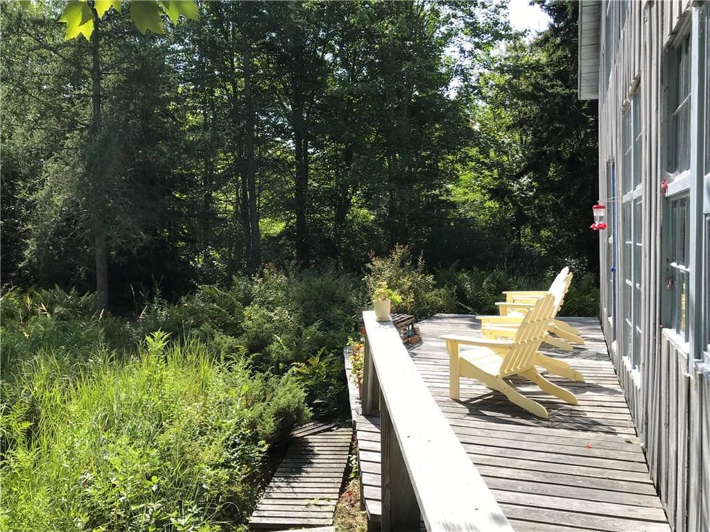 39 Beach Point Road St. George, ME 04860 - Photo 6 of 27 Deck that faces field.
