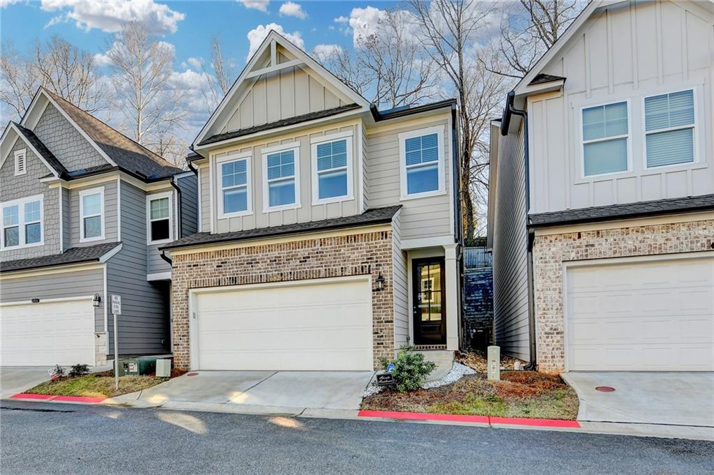 682 Smokey Quartz Way Kennesaw, GA 30144 - Photo 4 of 49 a view of front door and houses