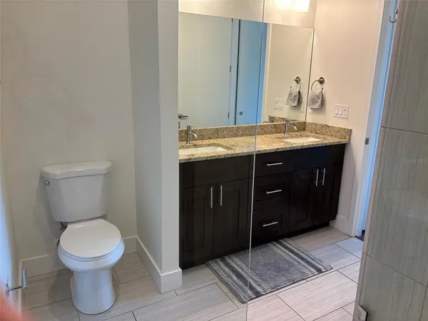 a bathroom with a sink and a toilet