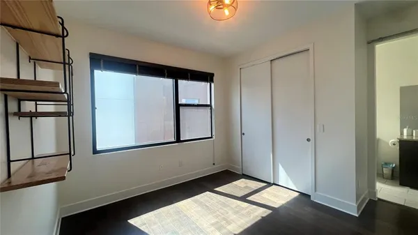 an empty room with windows