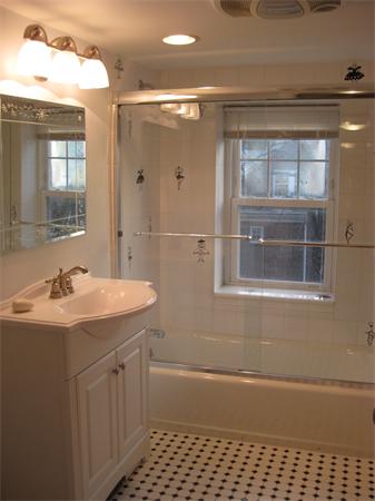274 Dean Road Brookline, MA 02445 - Photo 23 of 25 a bathroom with a sink a shower and a mirror
