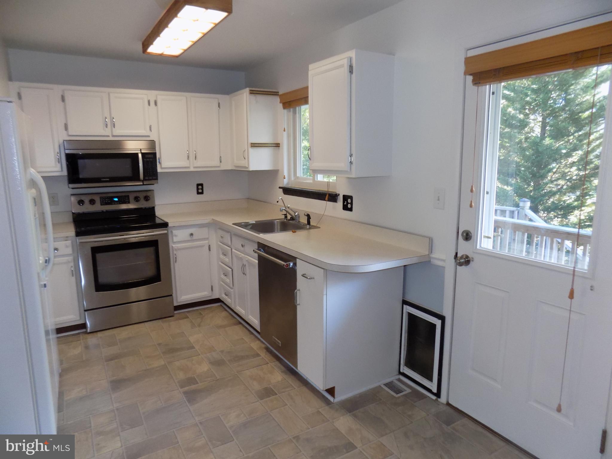 509 Londontown Road Edgewater, MD 21037 - Photo 2 of 22 Cabinets freshly painted.