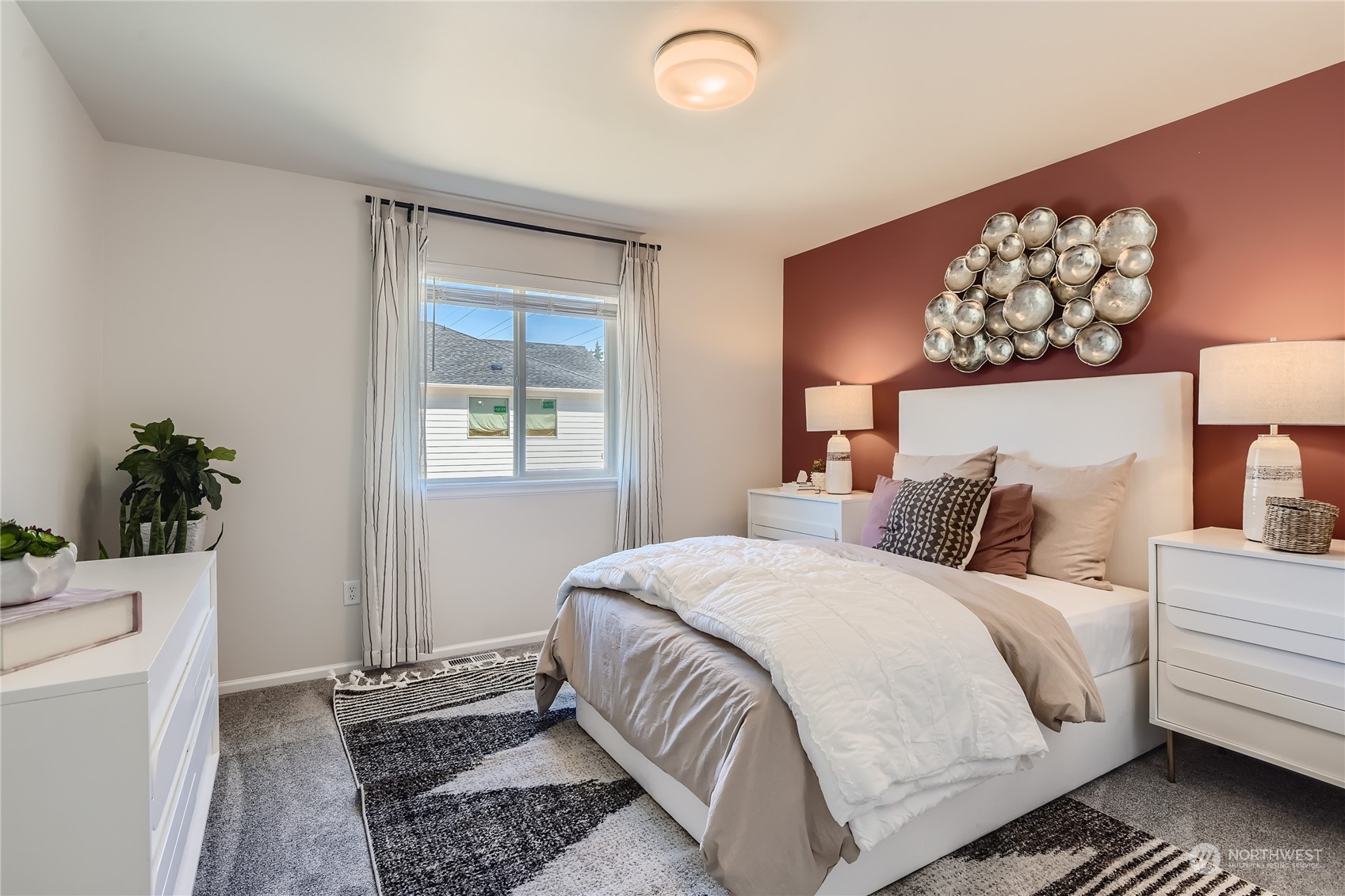 21005 42nd Avenue Southeast, Unit 112 Bothell, WA 98021 - Photo 3 of 24 a bedroom with a bed and a window