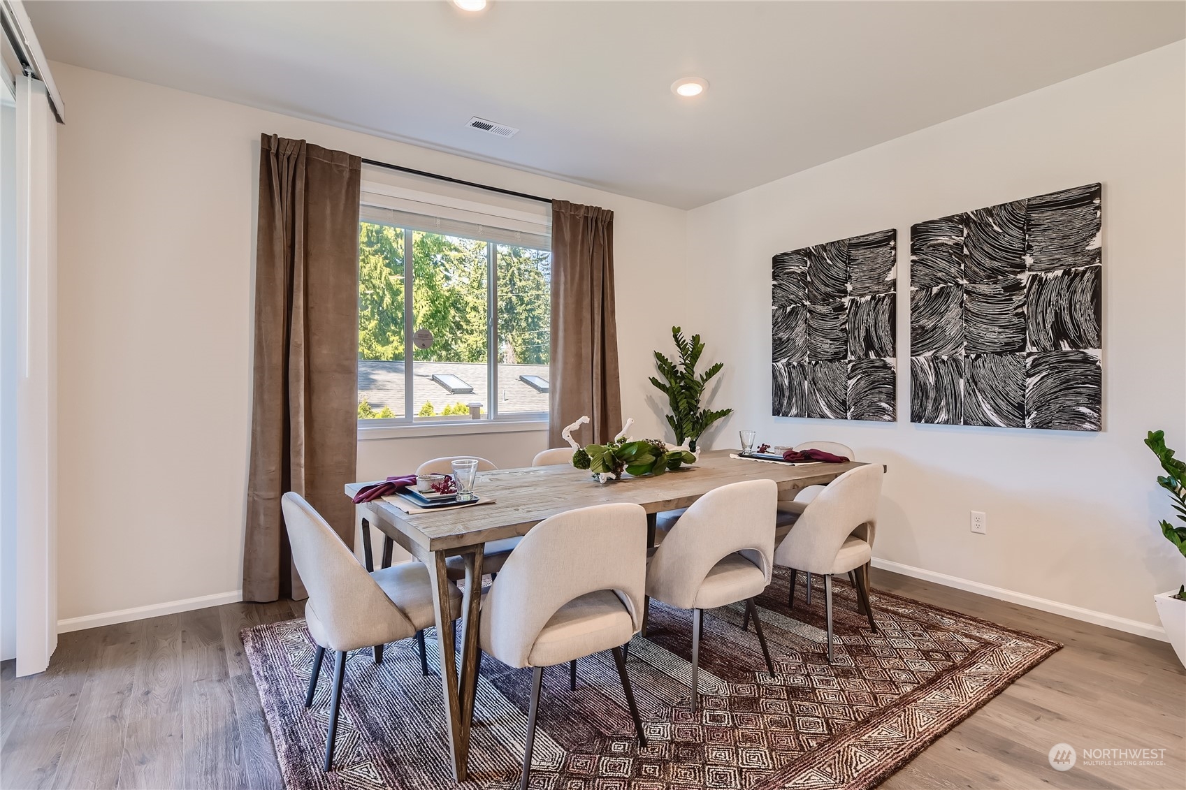 21005 42nd Avenue Southeast, Unit 112 Bothell, WA 98021 - Photo 6 of 24 a dining room with furniture and window