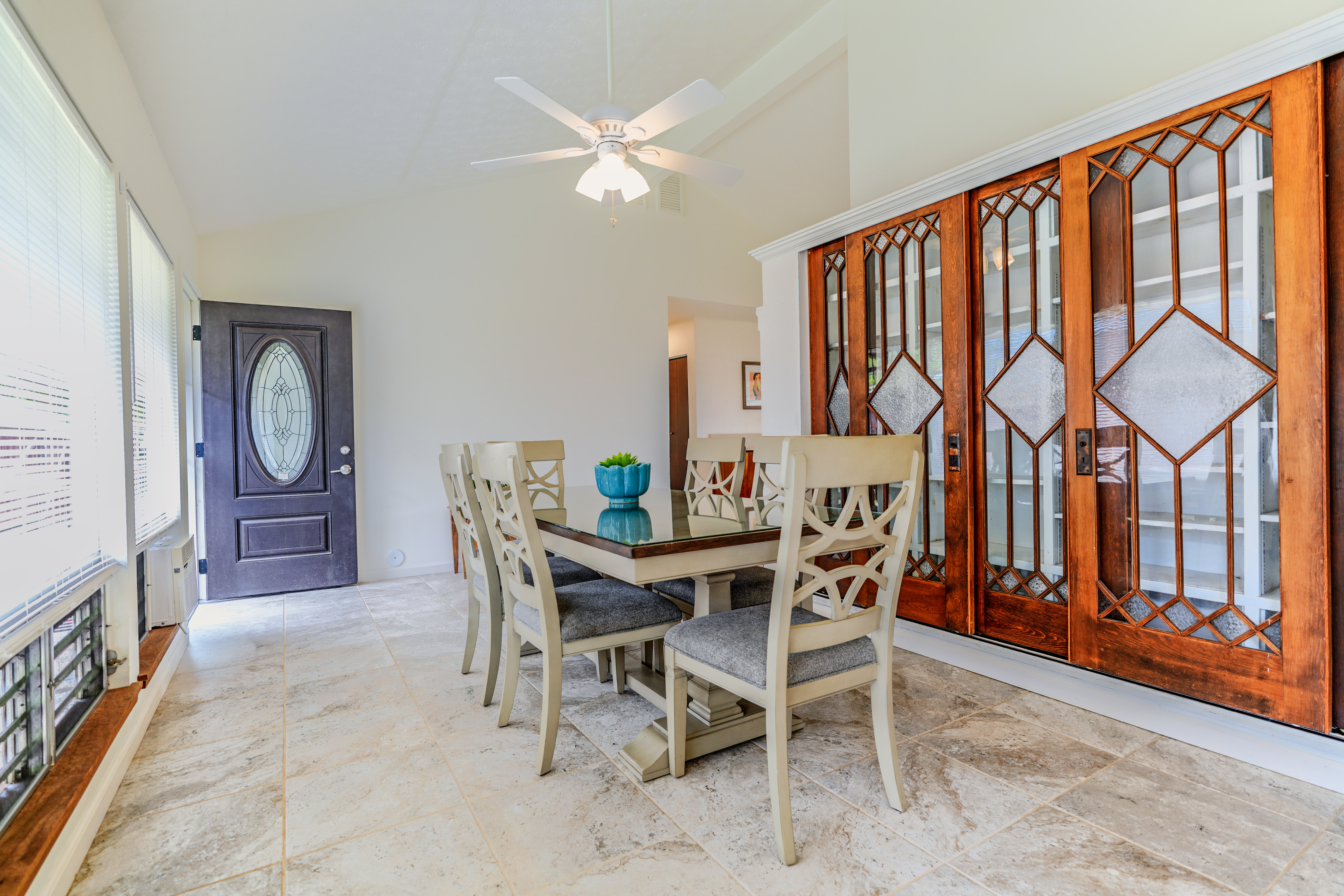 316 A Makani Road, Unit A Kapaa, HI 96746 - Photo 11 of 29 a view of a dining room with furniture window and wooden floor