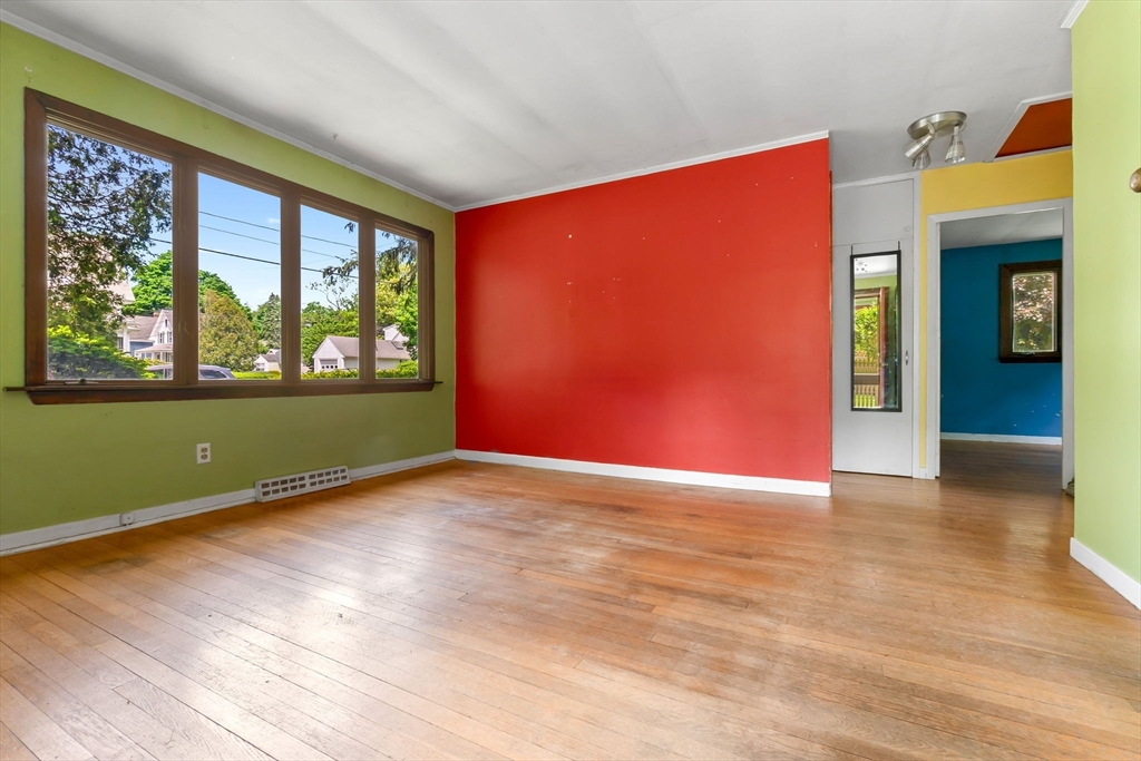 71 Union Street Hamilton, MA 01982 - Photo 2 of 21 a view of an empty room with a window and a bedroom