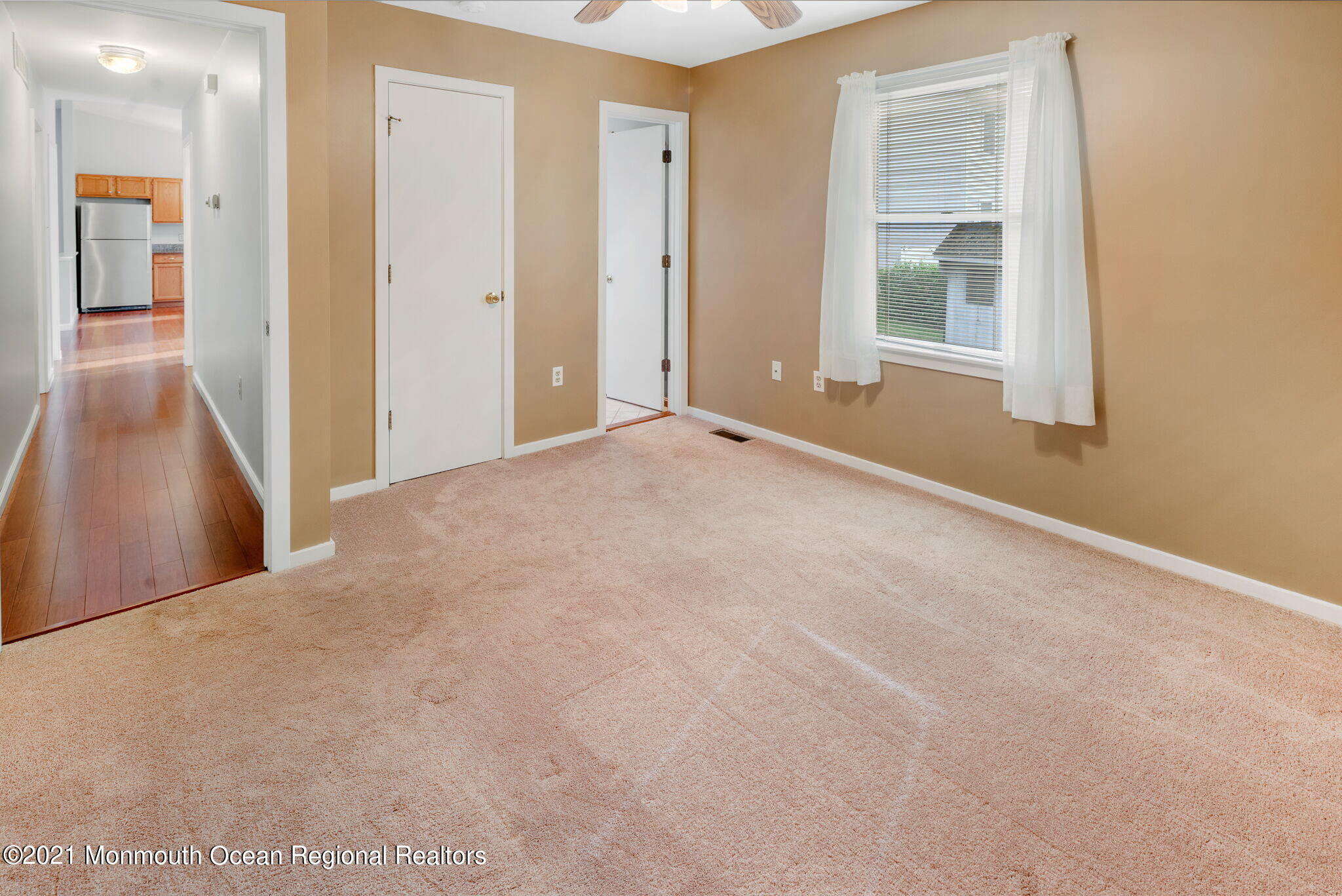 157 Mooring Road Manahawkin, NJ 08050 - Photo 22 of 49 a view of an empty room with a window