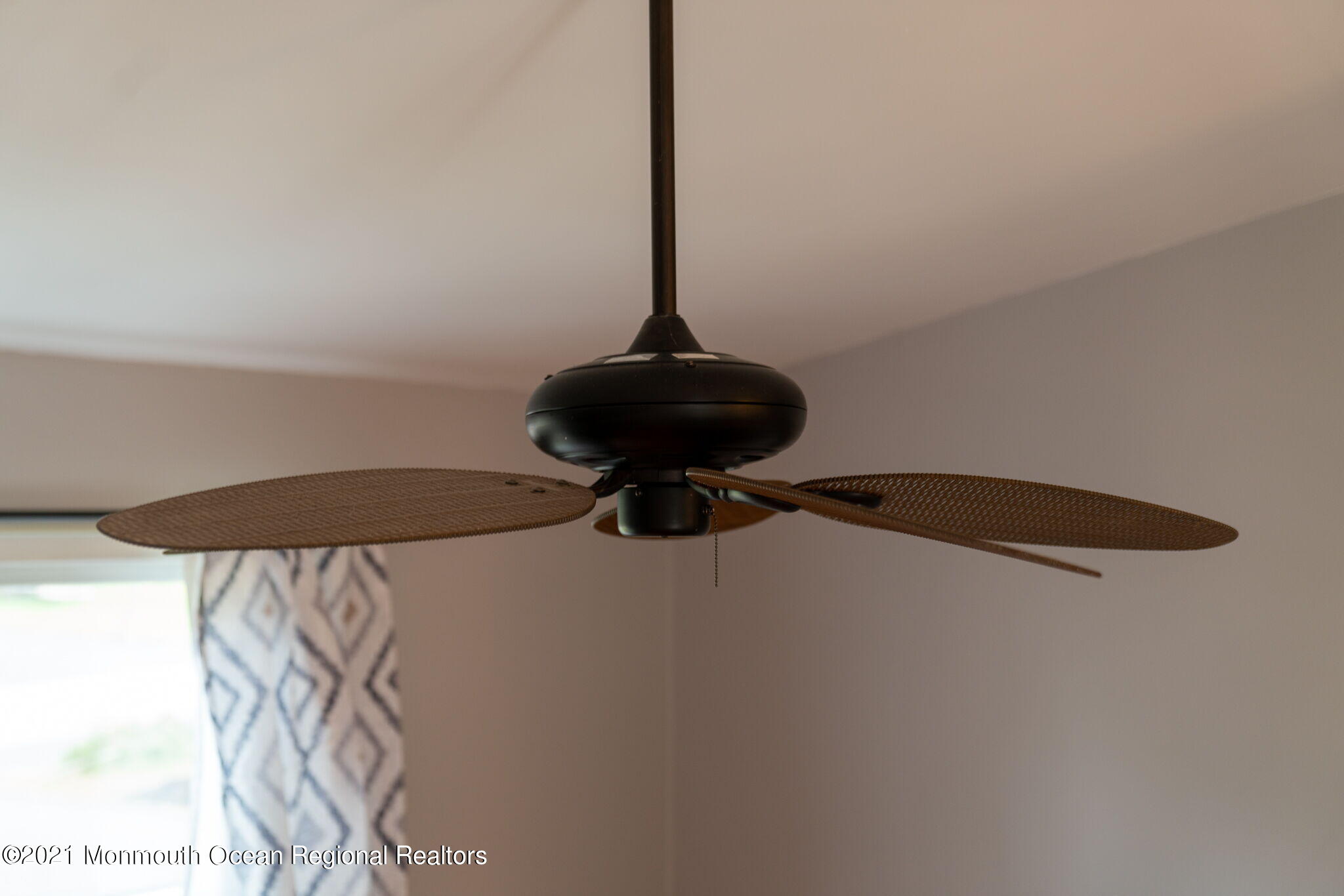157 Mooring Road Manahawkin, NJ 08050 - Photo 8 of 49 a close view of a light fixture in the kitchen