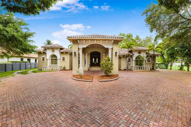 a view of outdoor space yard and front view of a house