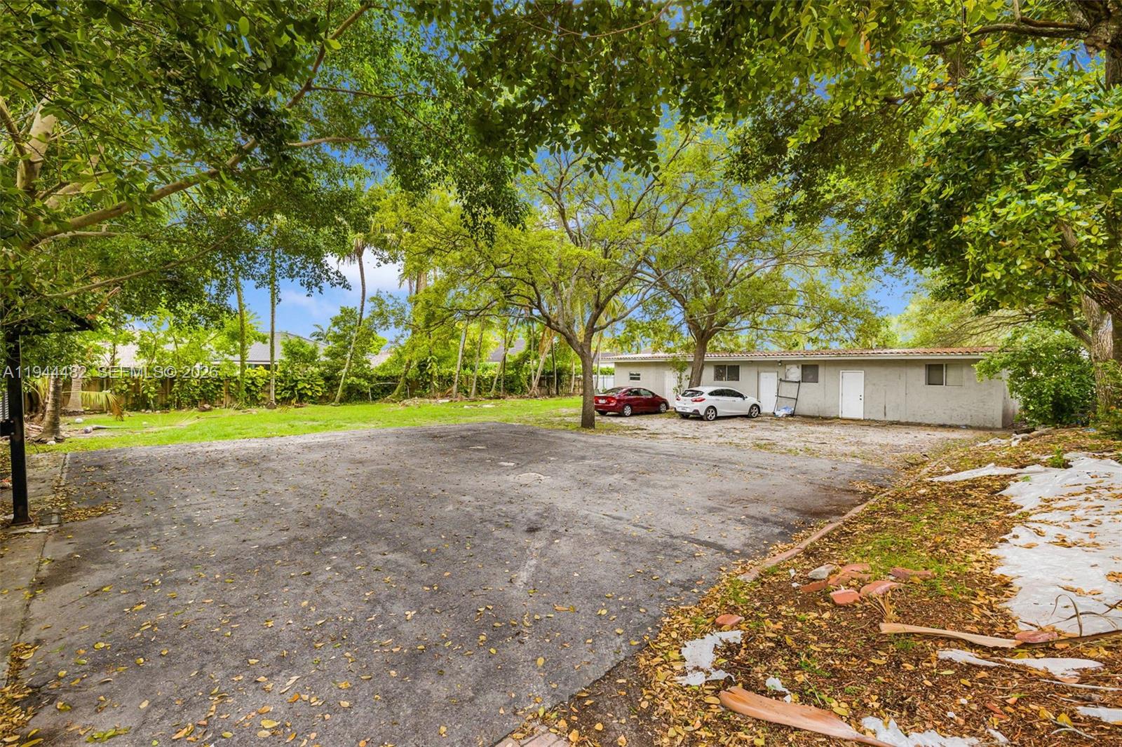 7761 Southwest 122nd Avenue Miami, FL 33183 - Photo 12 of 54 a view of outdoor space with yard