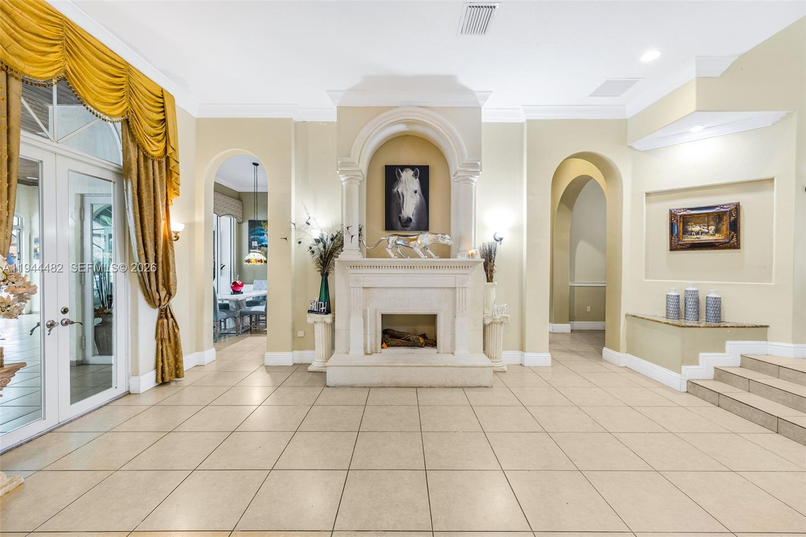 7761 Southwest 122nd Avenue Miami, FL 33183 - Photo 13 of 54 a view of a livingroom with a fireplace