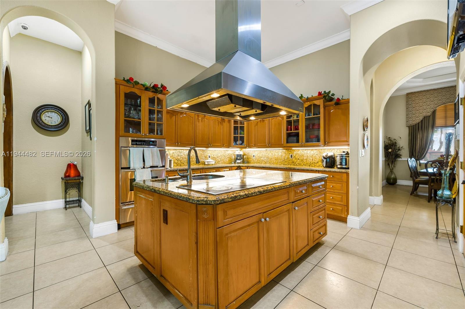 7761 Southwest 122nd Avenue Miami, FL 33183 - Photo 16 of 54 a kitchen with a sink and cabinets