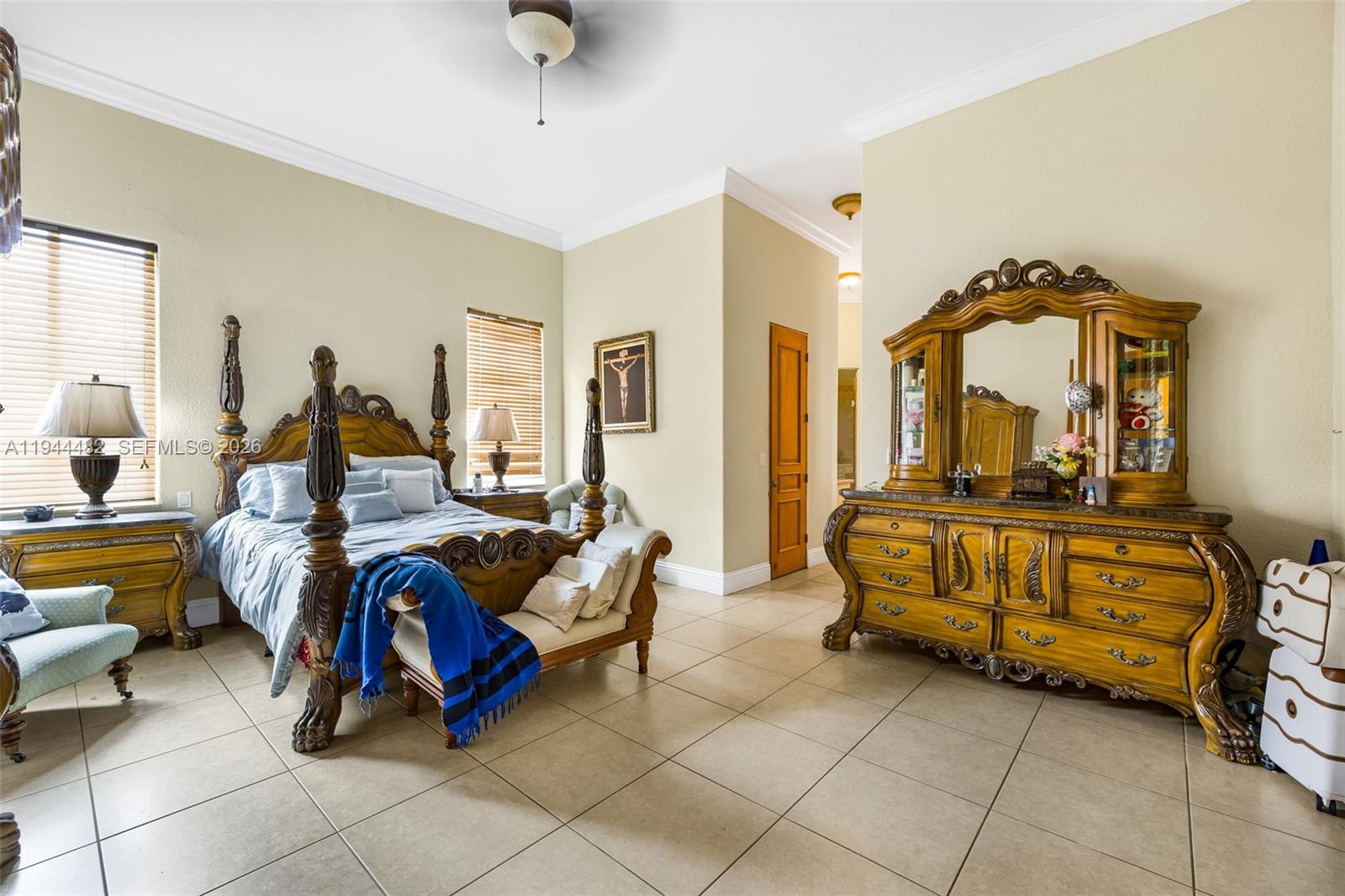 7761 Southwest 122nd Avenue Miami, FL 33183 - Photo 20 of 54 a bed room with furniture and a mirror