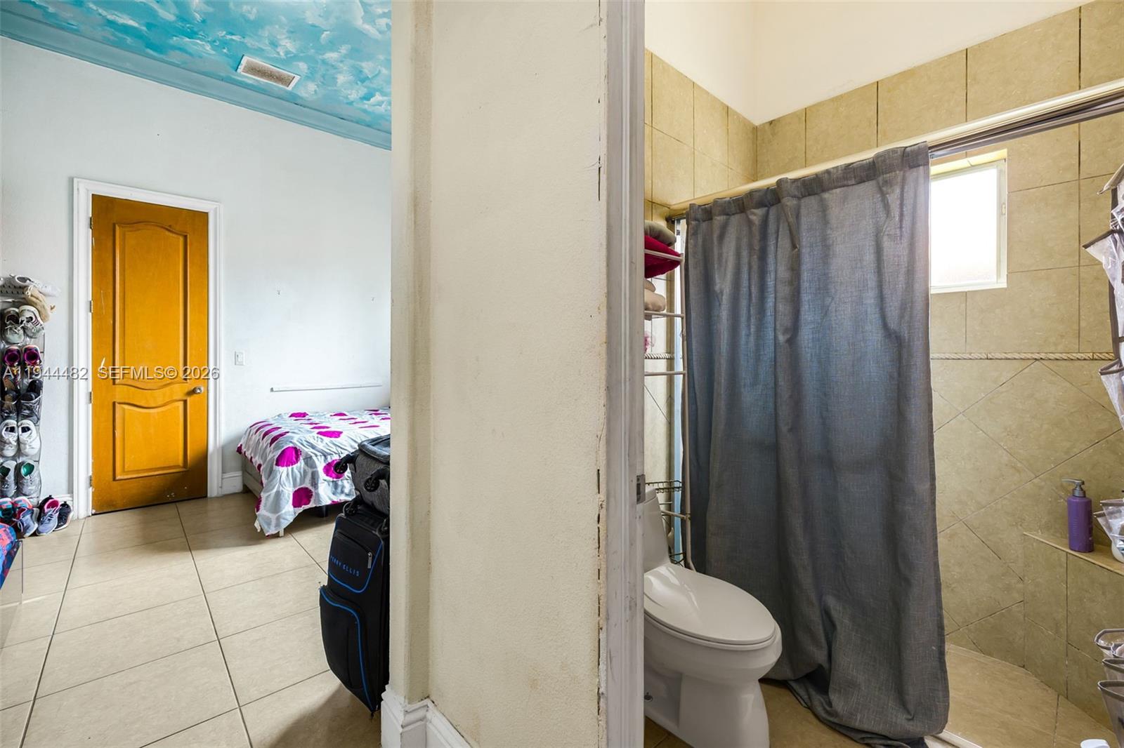 7761 Southwest 122nd Avenue Miami, FL 33183 - Photo 33 of 54 a bathroom with a sink toilet and shower