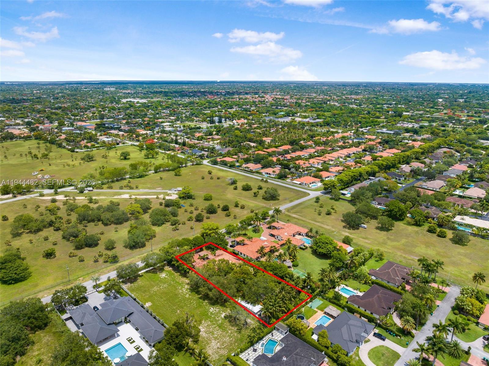 7761 Southwest 122nd Avenue Miami, FL 33183 - Photo 51 of 54 an aerial view of residential houses with outdoor space