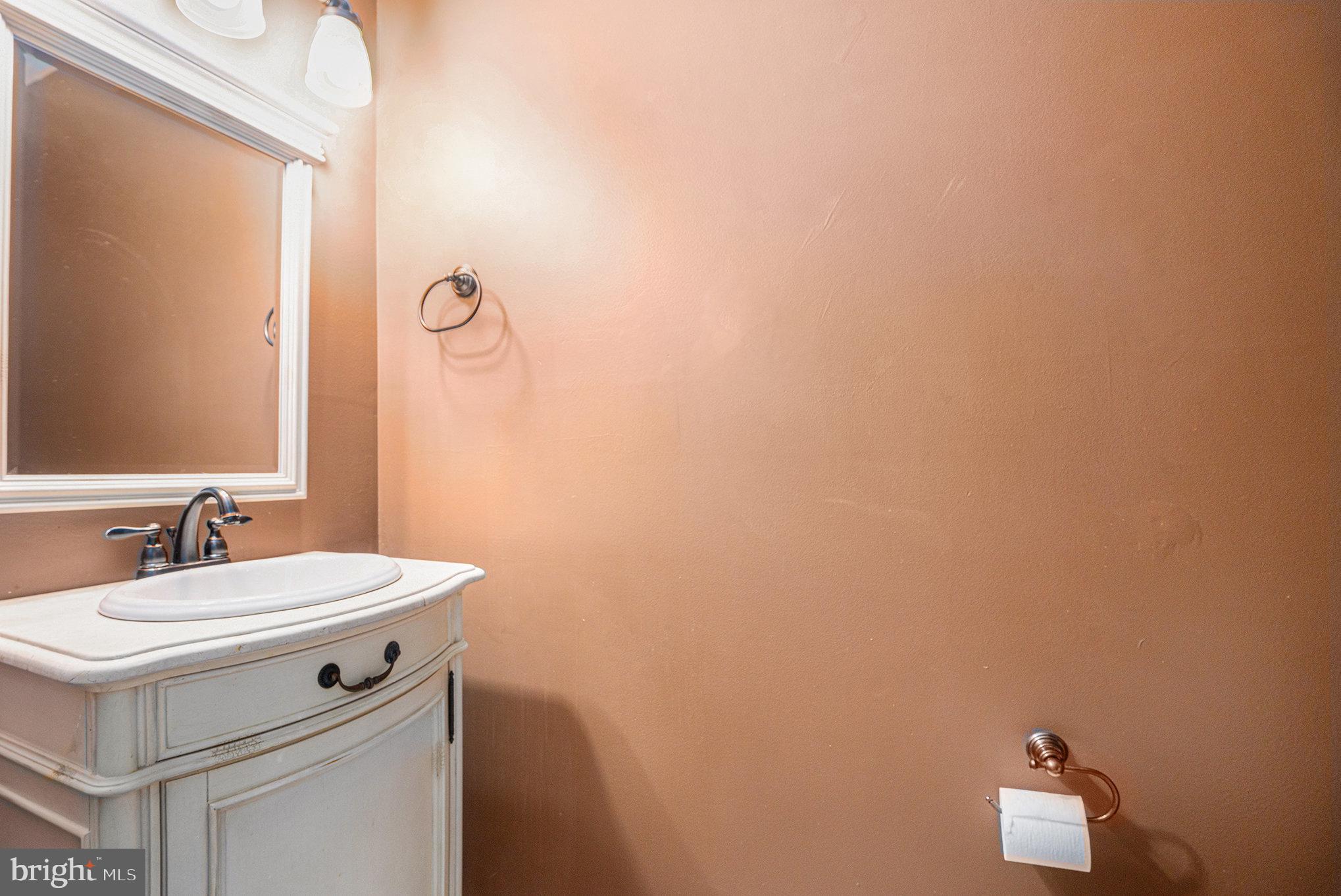 1042 Rafter Road Eagleville, PA 19403 - Photo 13 of 26 a bathroom with a sink and a mirror