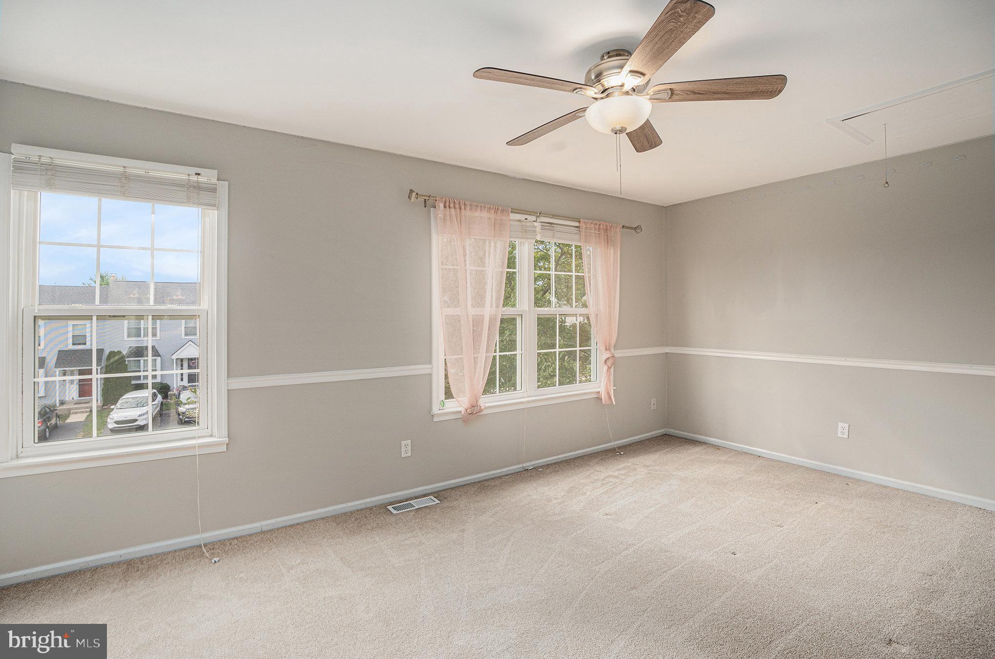 1042 Rafter Road Eagleville, PA 19403 - Photo 17 of 26 a view of an empty room with a window
