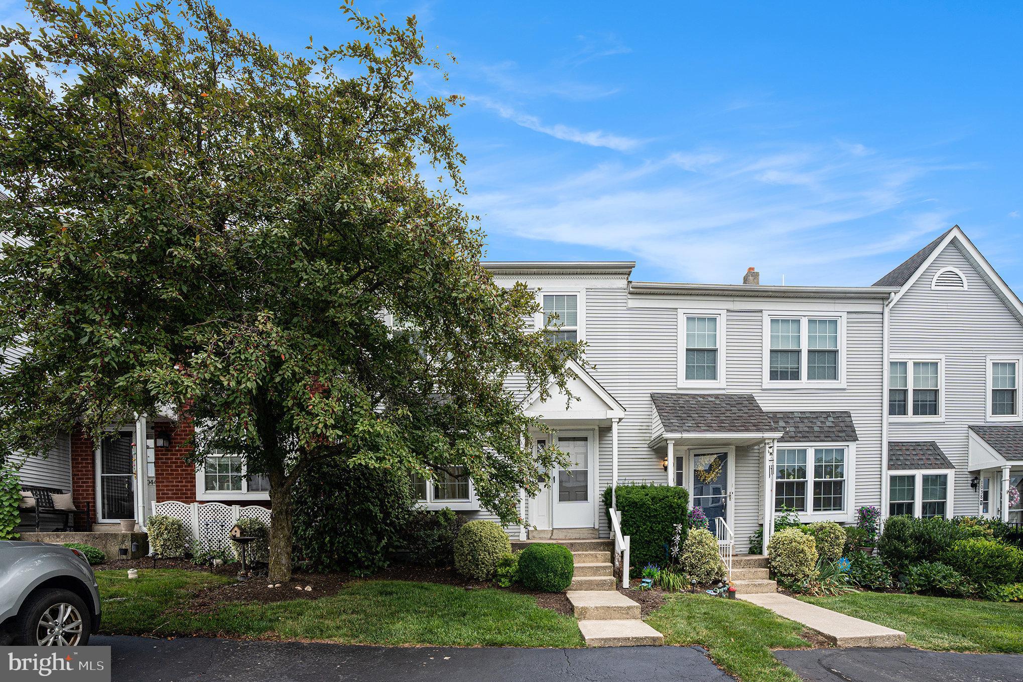 1042 Rafter Road Eagleville, PA 19403 - Photo 2 of 26 front view of a house with a yard