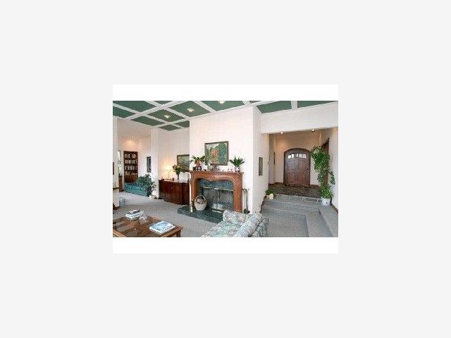 625 Quail Run Road Aptos, CA 95003 - Photo 6 of 8 a living room with furniture and a fireplace