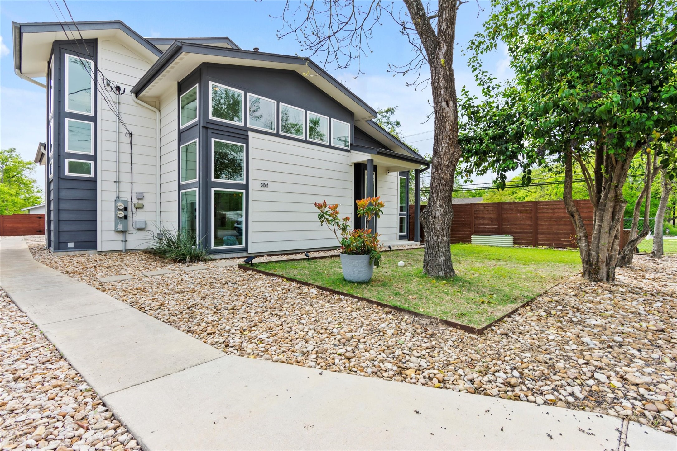 513 West Croslin Street, Unit A Austin, TX 78752 - Photo 3 of 32 Beautiful entry to this bright and airy home