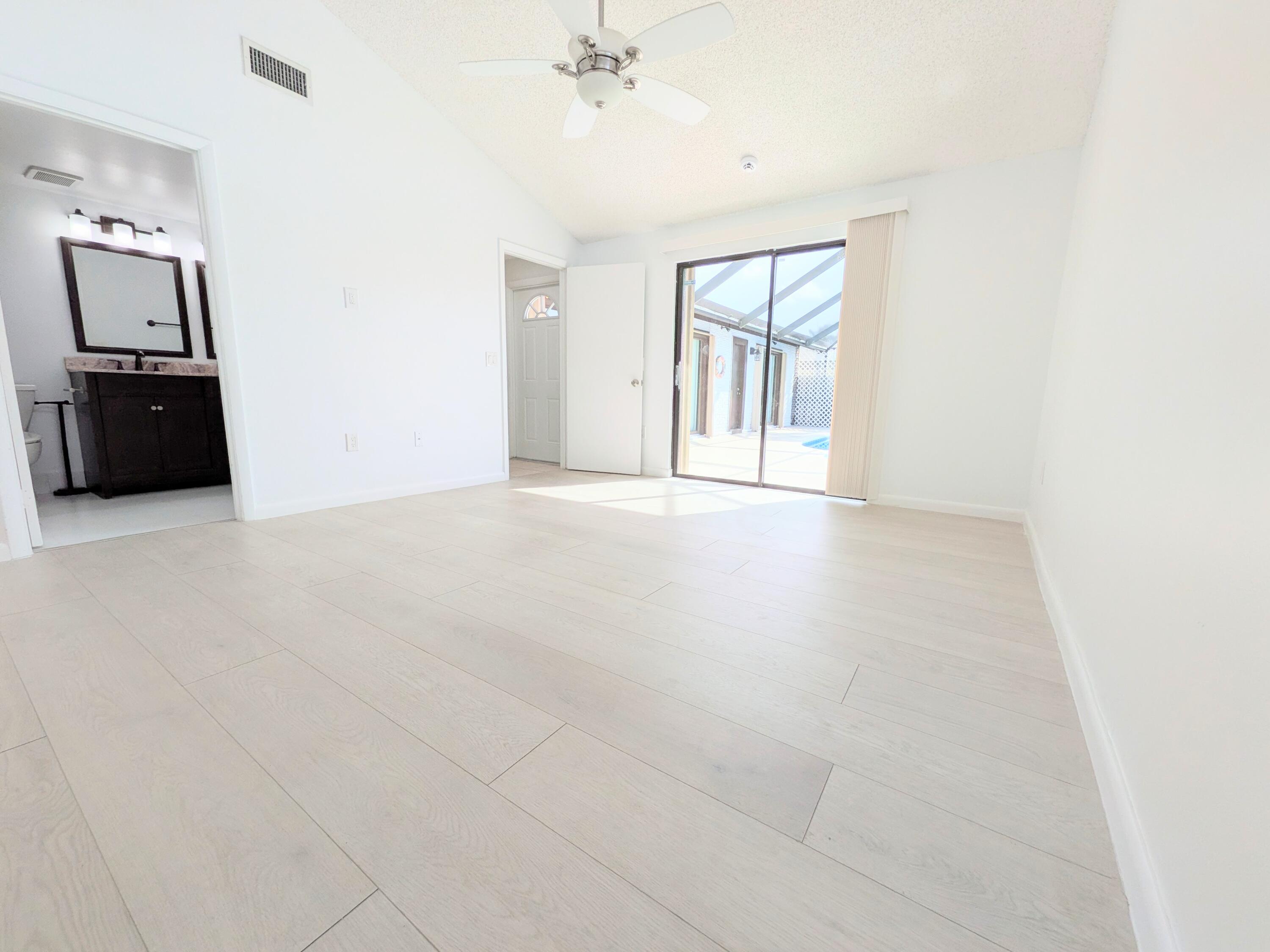 9975 Boca Gardens Trail, Unit A Boca Raton, FL 33496 - Photo 7 of 21 Primary Bedroom