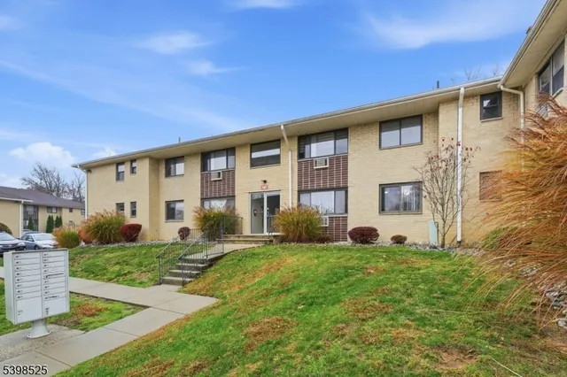 a view of house with yard