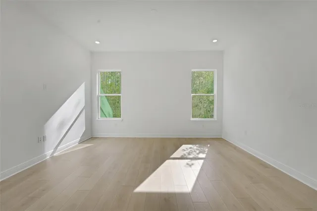 an empty room with windows