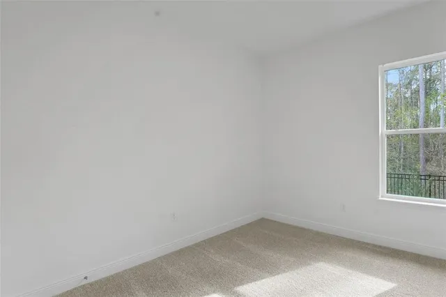 a view of storage and utility room with empty racks