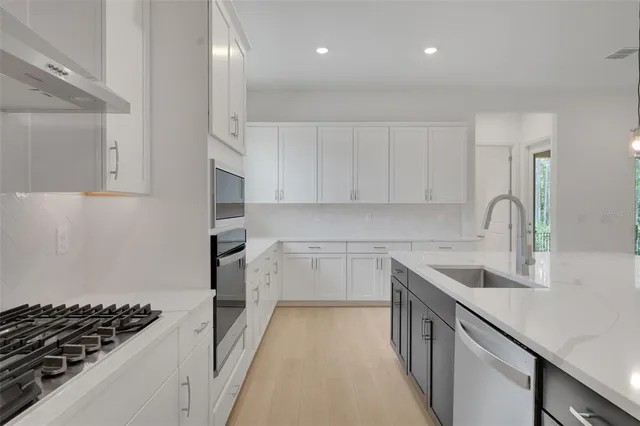 a view of a hallway with stairs