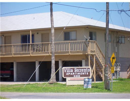 4502 Surfside Boulevard, Unit 6 Corpus Christi, TX 78402 - Photo 2 of 5 a front view of a house