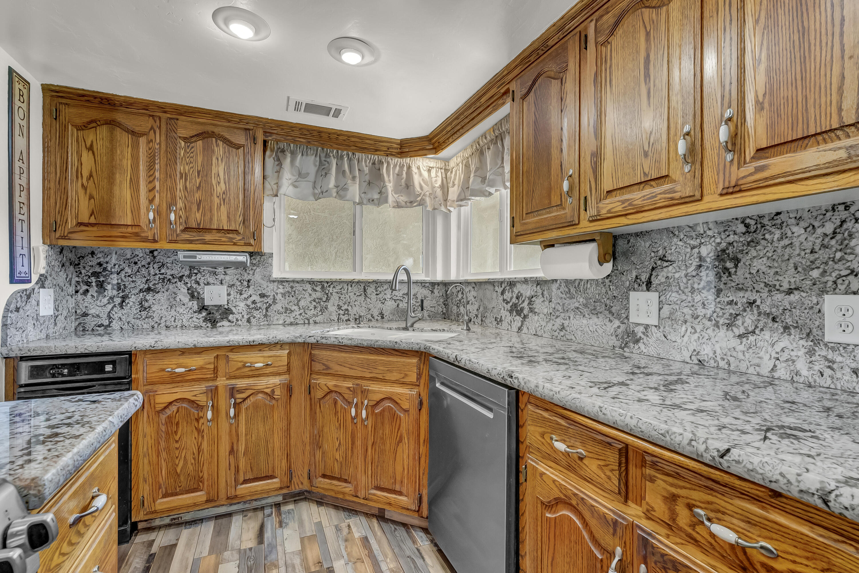 18002 320th Road Springville, CA 93265 - Photo 28 of 56 a kitchen with stainless steel appliances granite countertop a sink and cabinets