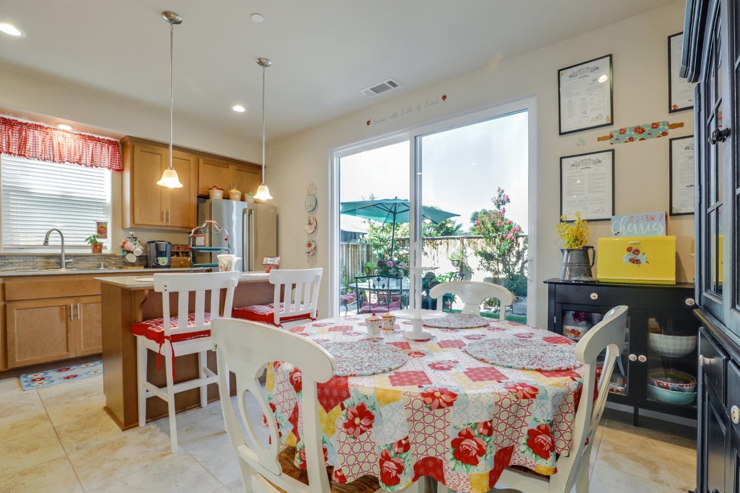 260 Springtime Circle Hollister, CA 95023 - Photo 16 of 46 a outdoor dining space with furniture and chandelier