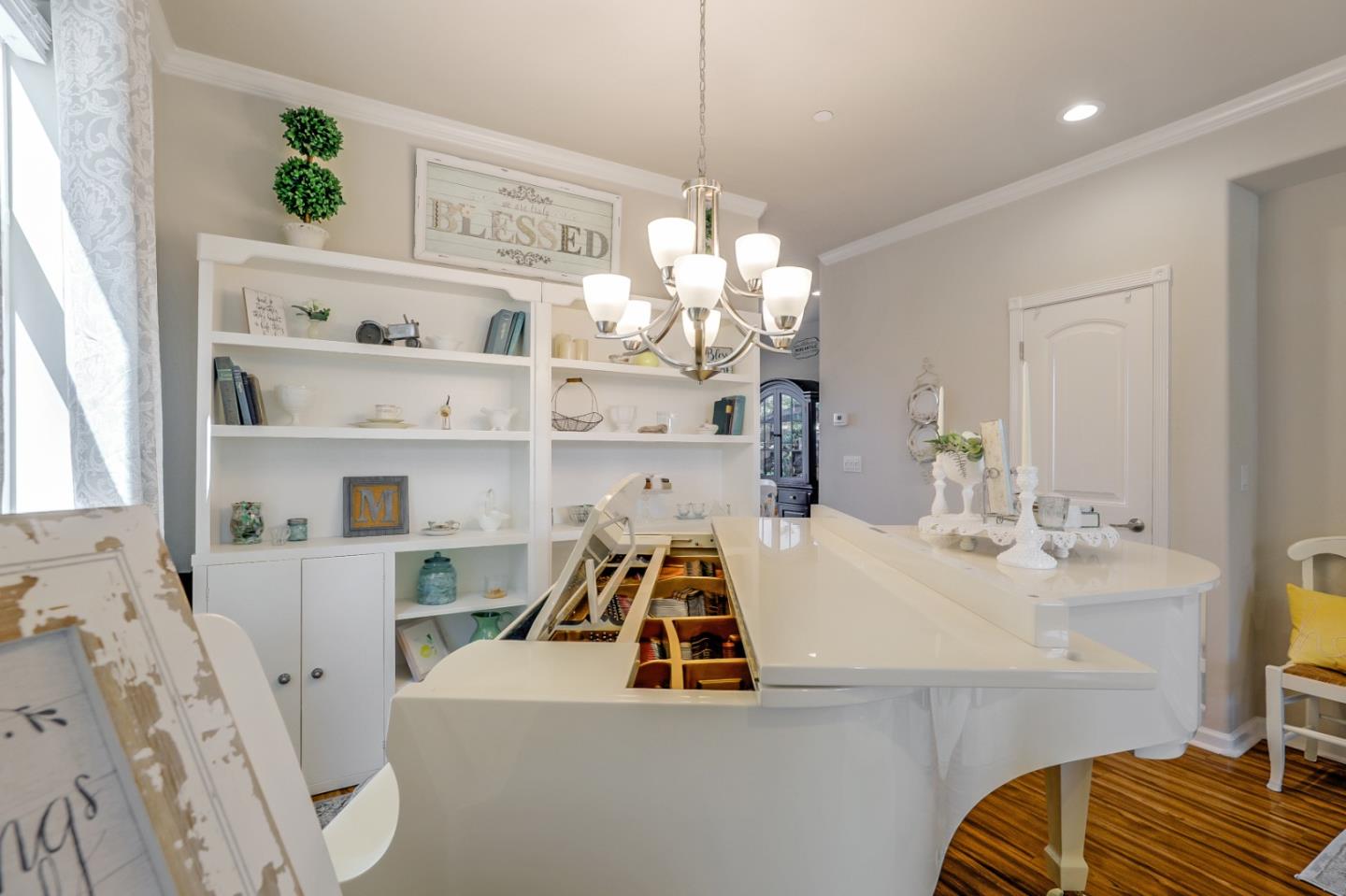 260 Springtime Circle Hollister, CA 95023 - Photo 20 of 46 a room with table chairs and a chandelier
