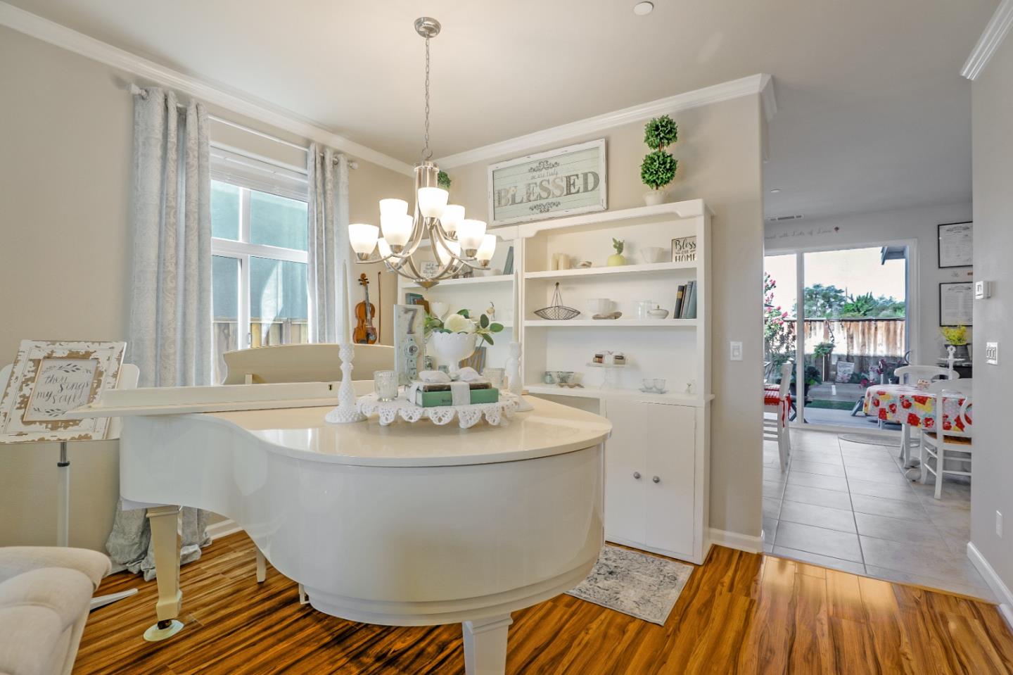 260 Springtime Circle Hollister, CA 95023 - Photo 21 of 46 a dining room with wooden floor