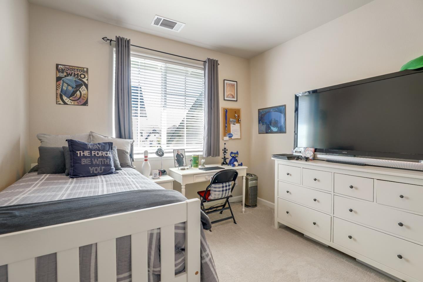 260 Springtime Circle Hollister, CA 95023 - Photo 29 of 46 a bedroom with a bed and a flat screen tv