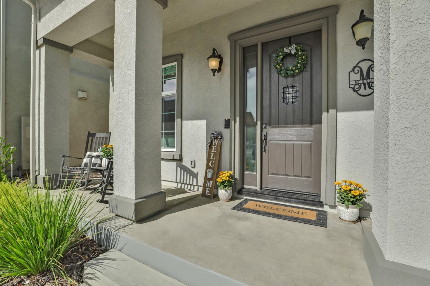260 Springtime Circle Hollister, CA 95023 - Photo 3 of 46 a living room with furniture and a potted plant