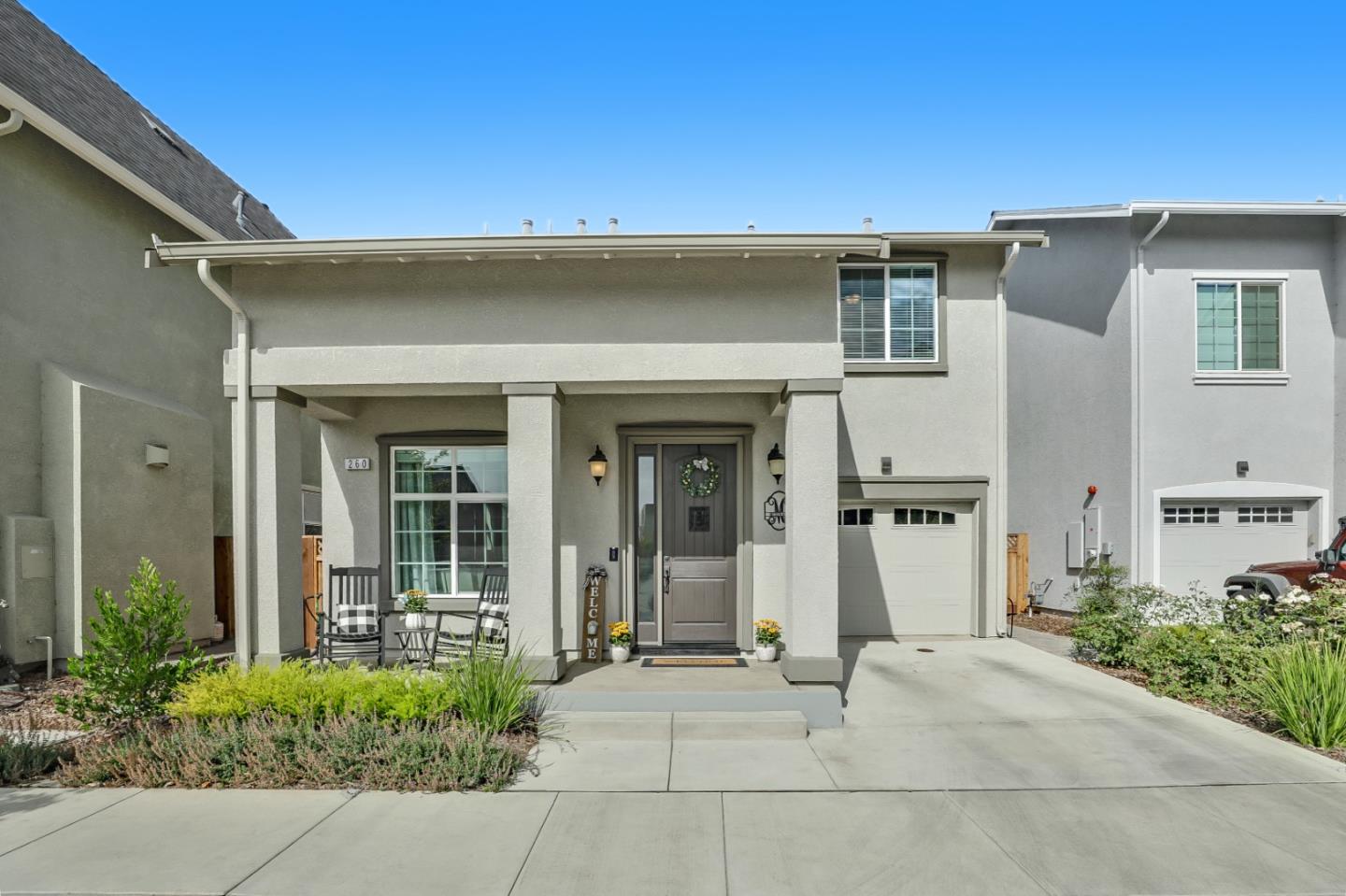 260 Springtime Circle Hollister, CA 95023 - Photo 4 of 46 front view of a building with potted plants