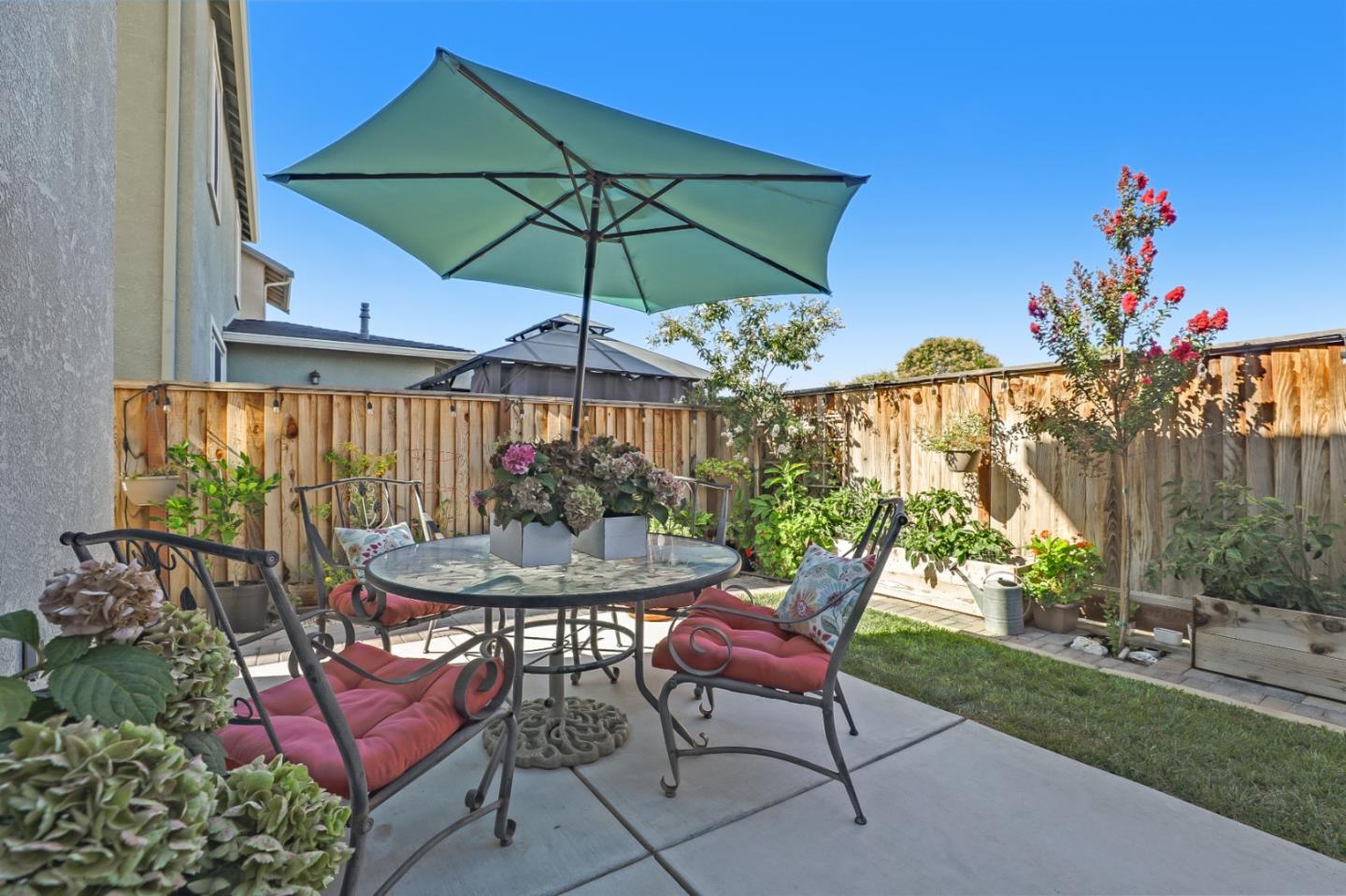 260 Springtime Circle Hollister, CA 95023 - Photo 42 of 46 a view of patio with furniture and a garden