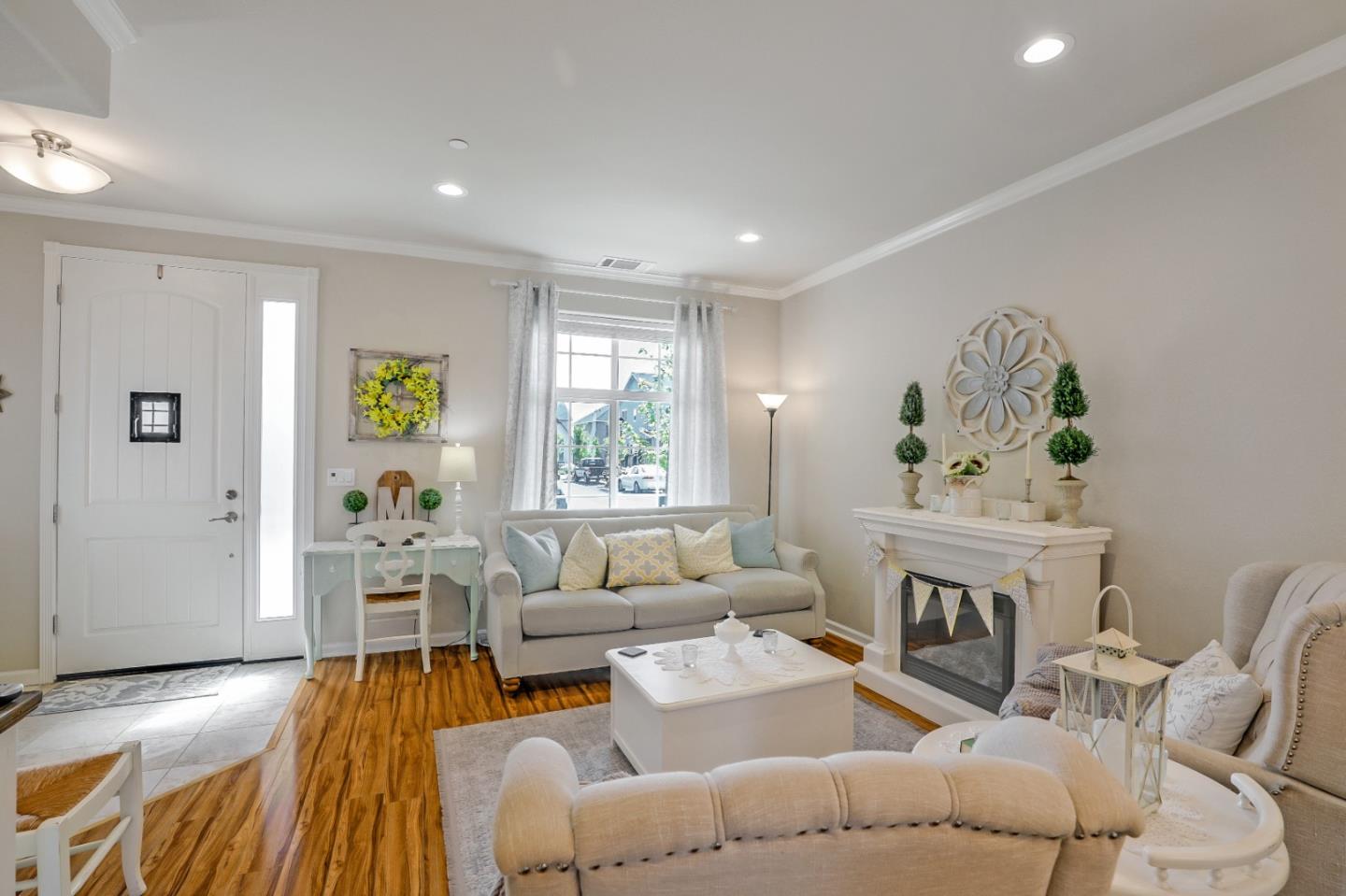 260 Springtime Circle Hollister, CA 95023 - Photo 6 of 46 a living room with furniture and a fireplace