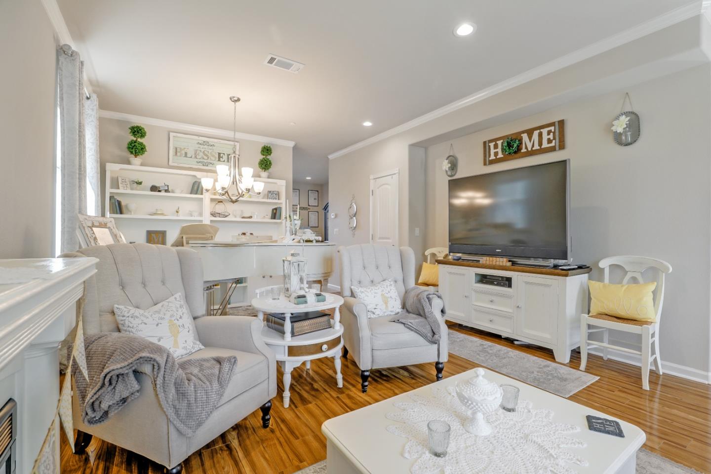 260 Springtime Circle Hollister, CA 95023 - Photo 8 of 46 a living room with furniture and a flat screen tv
