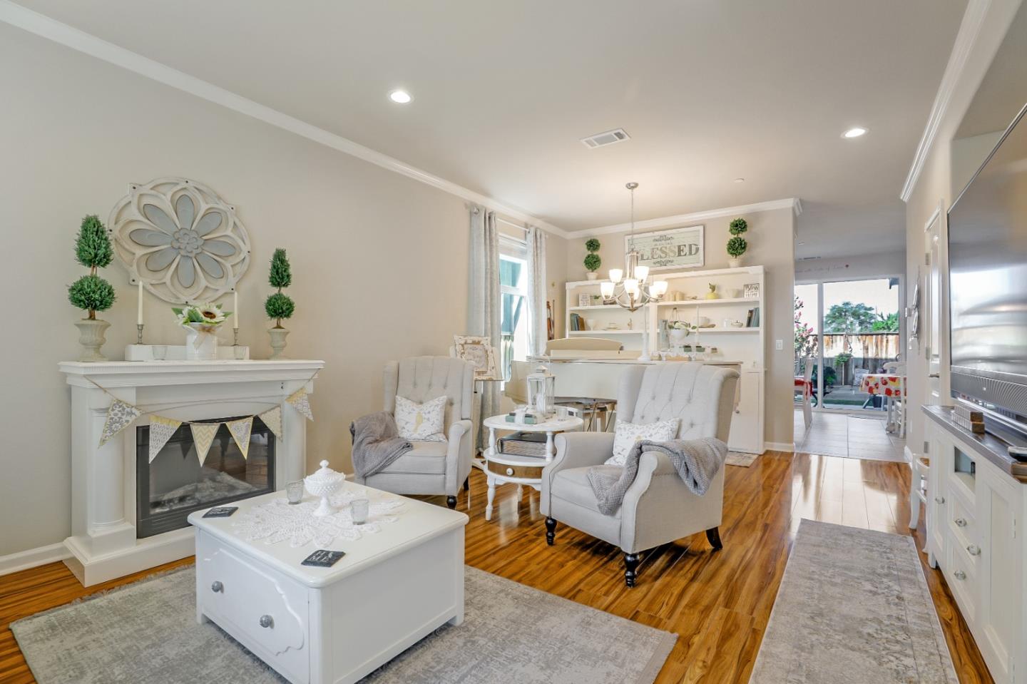 260 Springtime Circle Hollister, CA 95023 - Photo 9 of 46 a living room with furniture and a fireplace