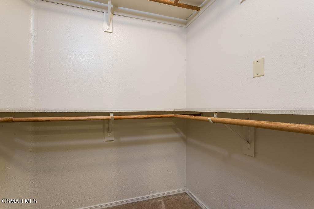 753 Congressional Road Simi Valley, CA 93065 - Photo 14 of 37 a view of a room with racks on the wall