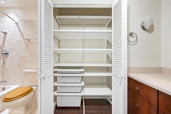 a bathroom with a toilet and a sink