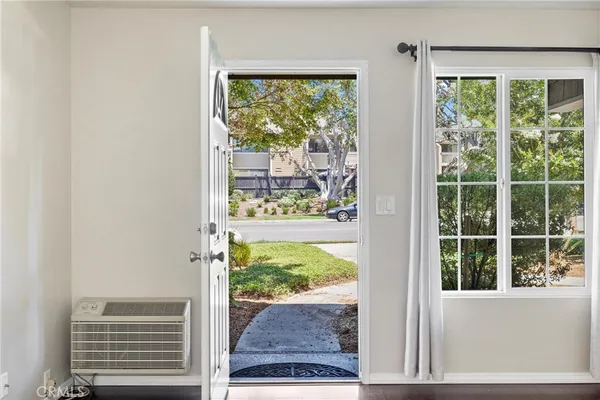 a view of a room that has a window in front of it